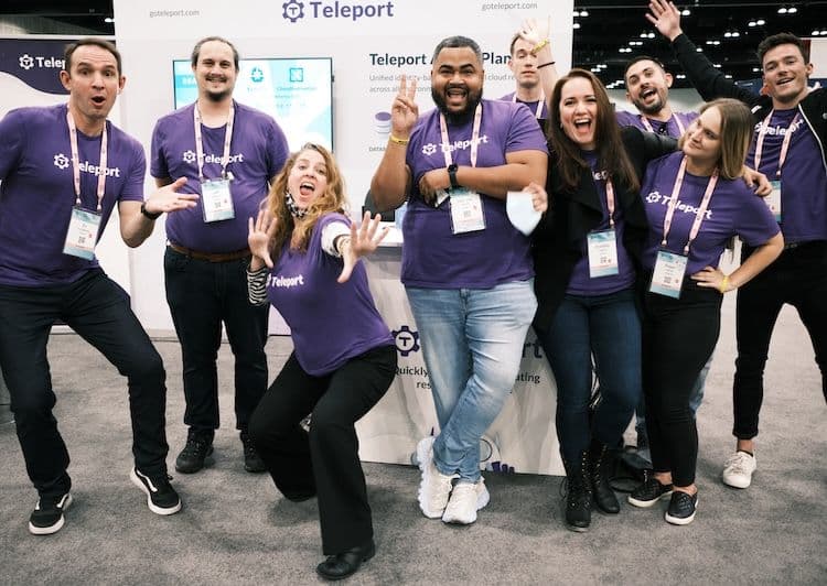 Teleport employees at Teleport's Kubecon booth