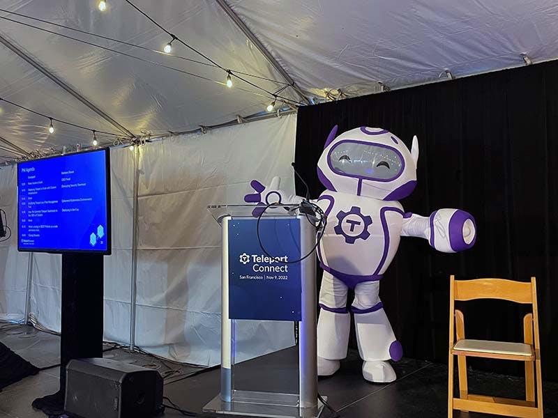 Photo of PAM mascot on stage at Teleport Connect 2022
